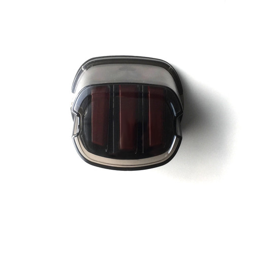 Harley Davidson "Eagle Claw" Red LED taillight with lightly smoked lens, white licence plate LED, and bright red brake LED